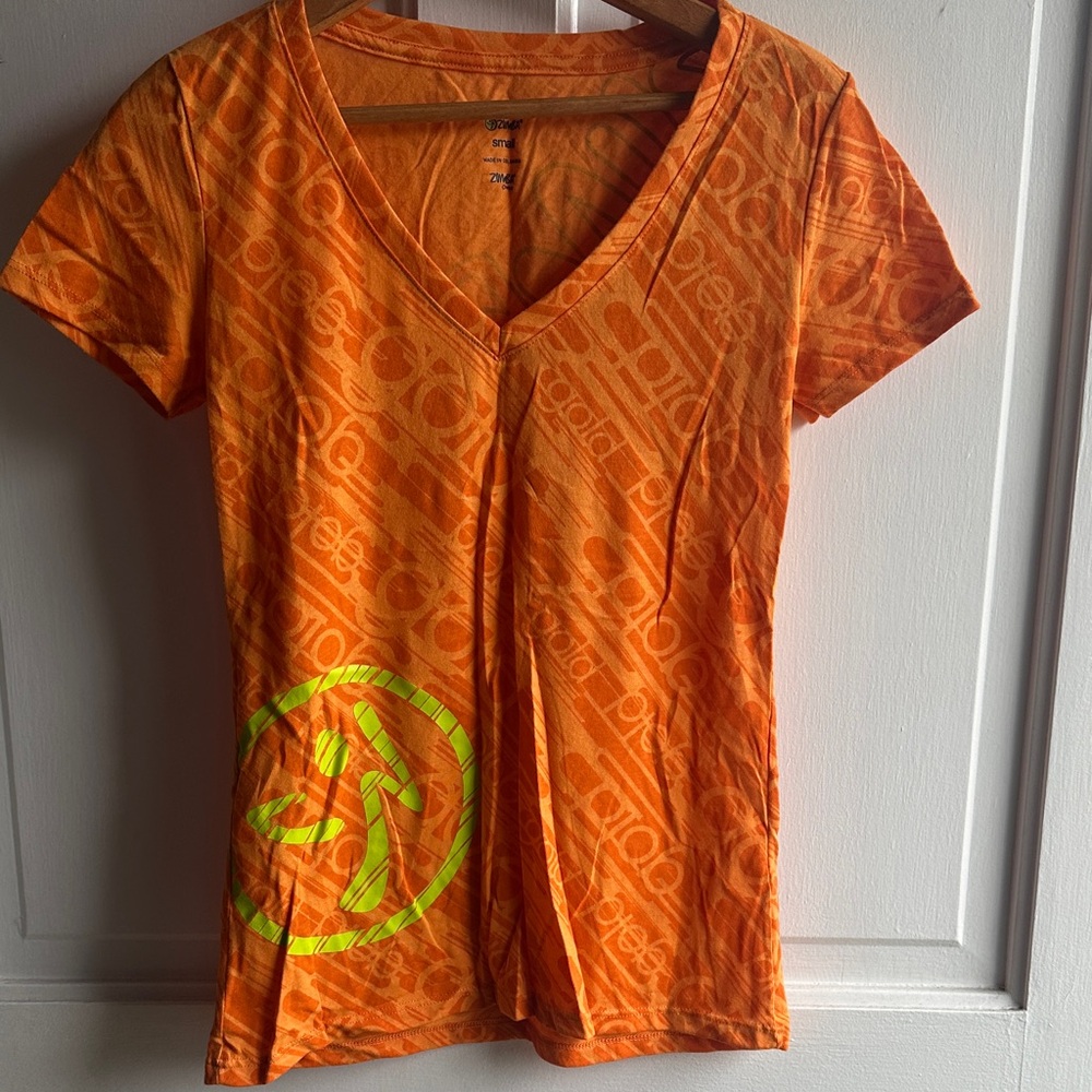 Zumba Fitness Orange V-Neck Tee with Neon Design